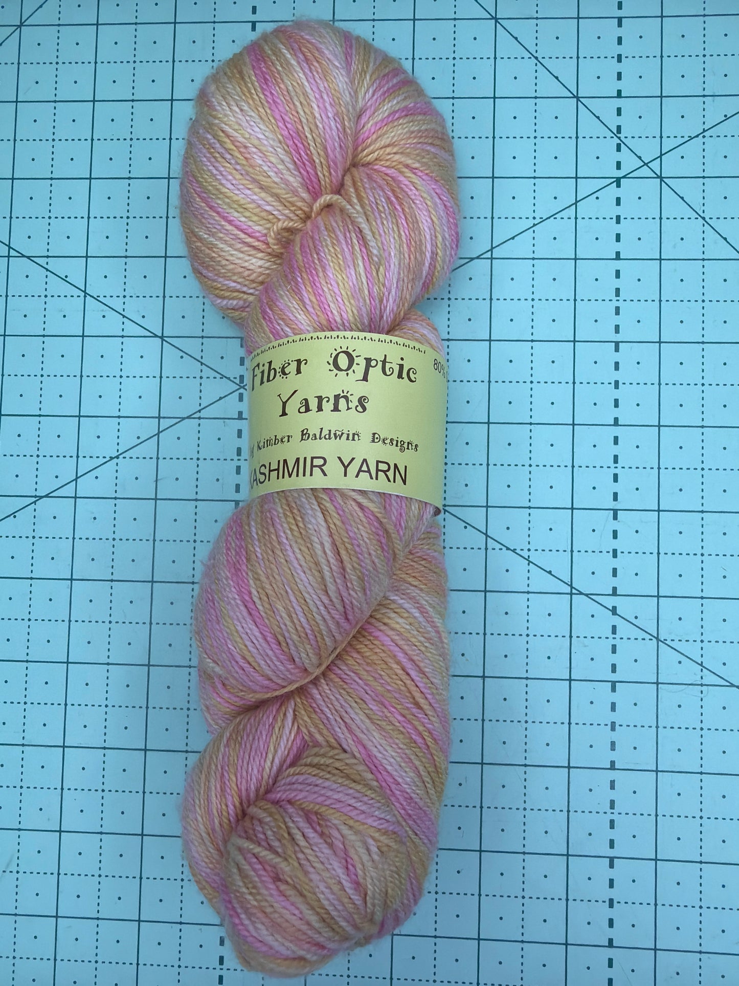 Hand died fingering weight yarn by fiber optic yarns
