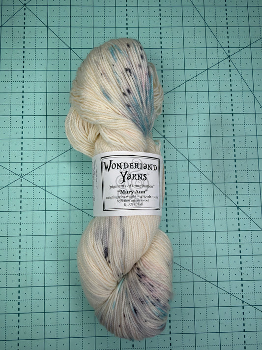 Hand dyed fingering weight yarn by Wonderland yarns